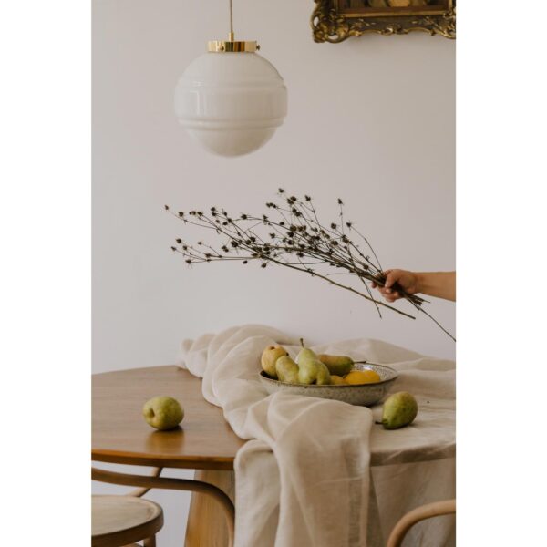 glass saturn pendant light opaline brass by the table